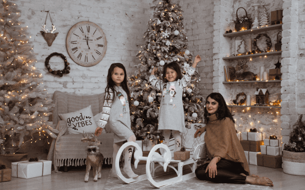 A 3 girls with decorated Christmas interiors in the living room
