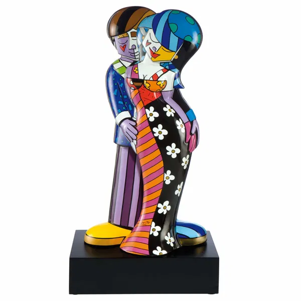 Romantic porcelain sculpture of a couple embracing, showcasing vibrant colors and playful patterns.