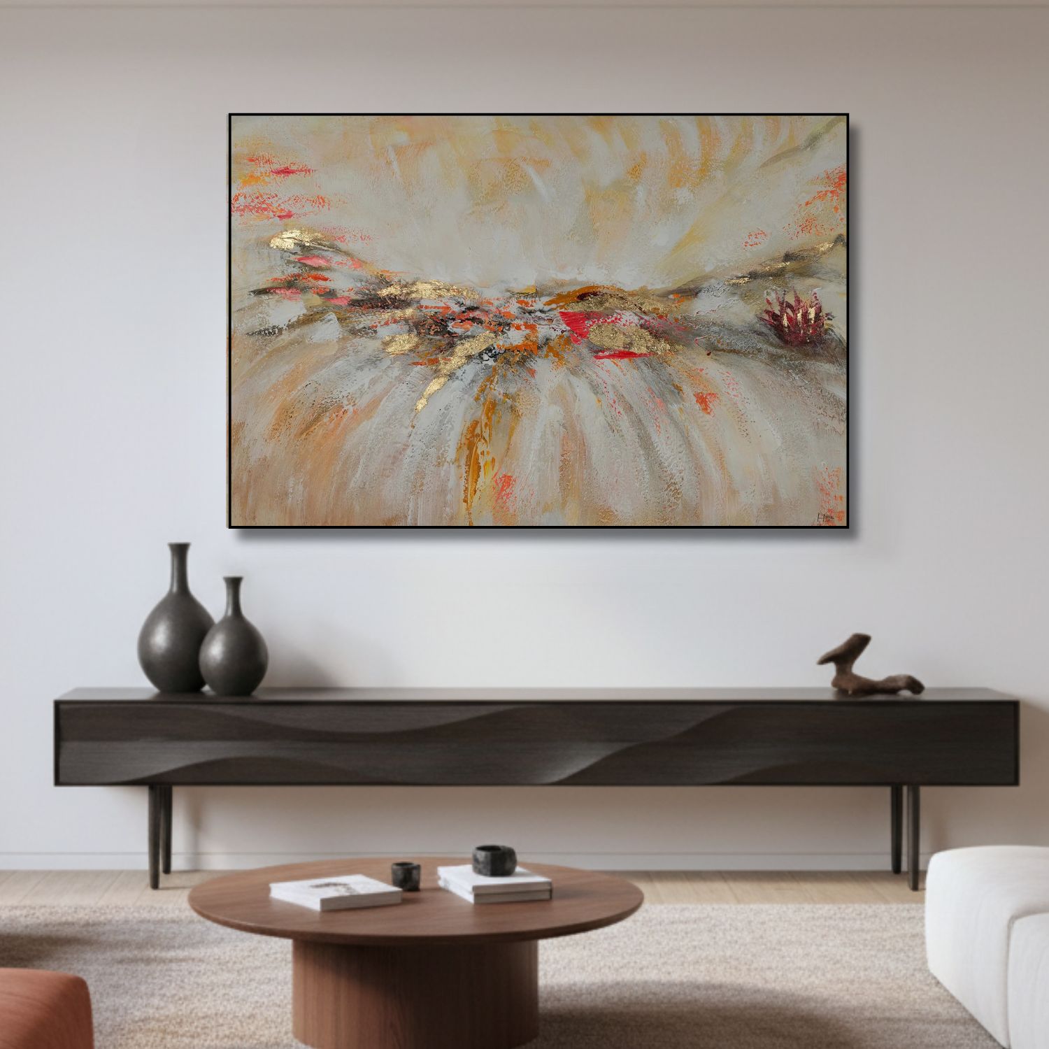 A large, textured abstract painting with soft beige, grey, and hints of red, displayed in a minimalist living room above a dark wood sideboard.