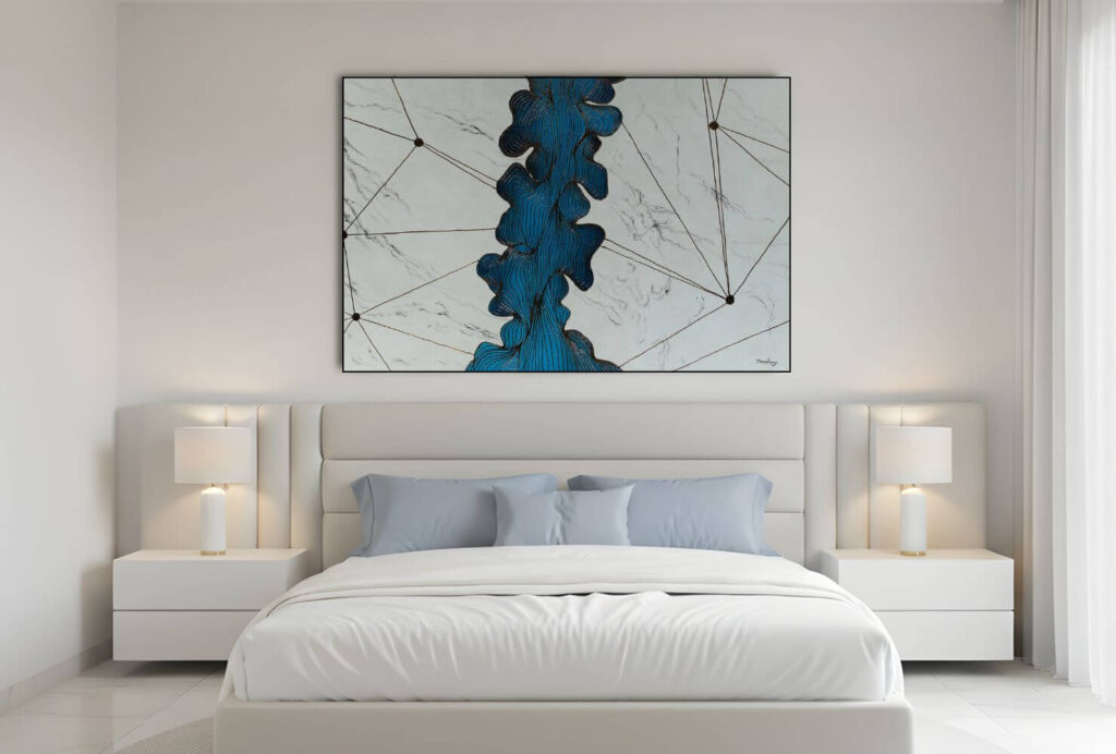 Abstract blue and gray artwork above a bed